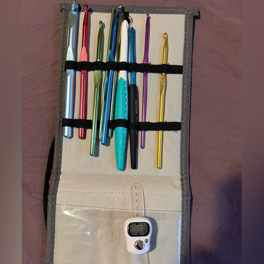 Crochet hooks incudes with a stitch & hook holder